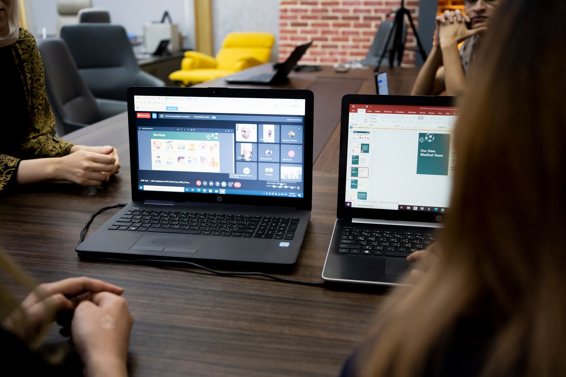 a nonprofit team in a meeting with Google Docs open on a laptop